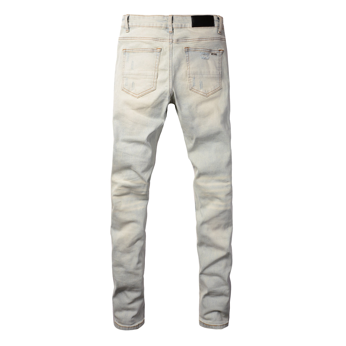 Men’s Light Washed Skinny Jeans with Heavy Ripped Details and Dark Contrast Patchwork for a Vintage Street Look 699