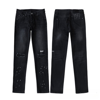 Black Distressed Flare Jeans with White Paint Splatter and Rivet Studs - High Waisted Ripped Bell Bottom Denim