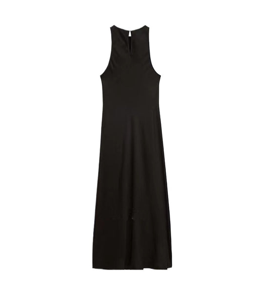 Vestido negro estilo Hepburn con corte ajustado en la cintura y largo