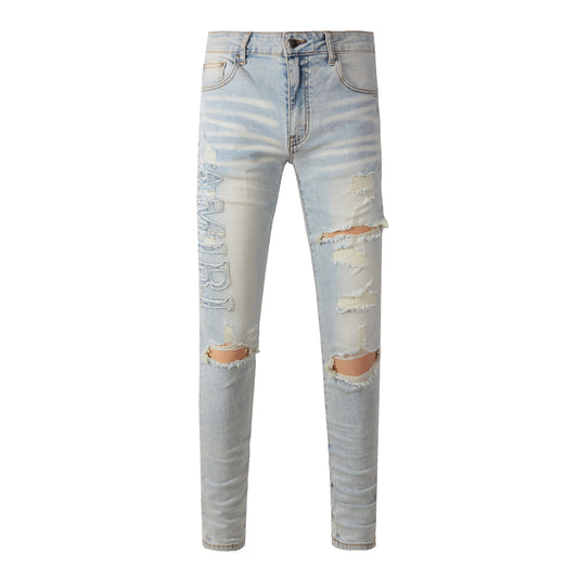 Pantalones casuales de mezclilla de calle, jeans ajustados rotos azules para jóvenes de algodón microelástico n.° 697 