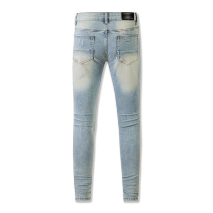 Blue Distressed Jeans with Muddy Yellow Wash and Faux Leather Patches for a Vintage Look