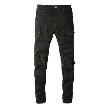 Jean slim noir pour homme avec grandes déchirures au genou et motif patchwork 