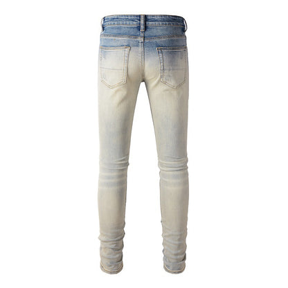 887 Jeans déchirés Street Tide européens et américains Pantalons slim High Street Tide Jeans 