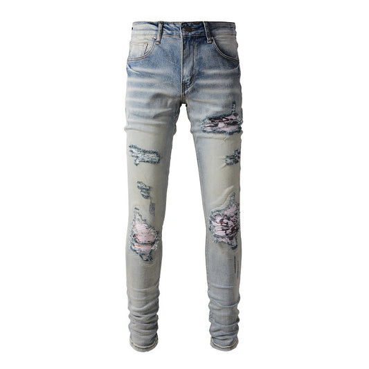 Jean déchiré Street Tide européen et américain épuisé Pantalon slim High Street Tide en denim