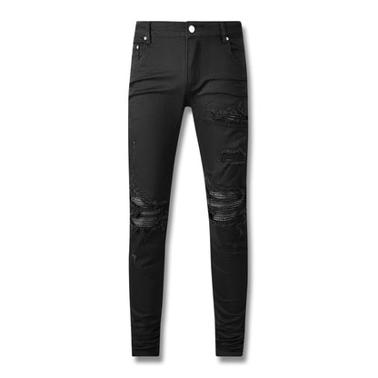 Jean noir vieilli 602 avec patchwork en similicuir pour un look avant-gardiste 