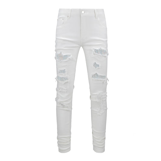 Jean blanc moulant pour homme avec strass et patchwork pour un style urbain 