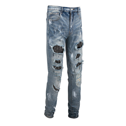 Jean slim noir pour homme avec motif de peinture et aspect patchwork vieilli 