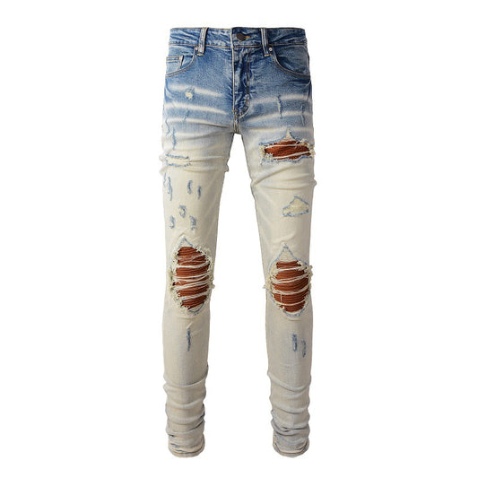 887 Jeans déchirés Street Tide européens et américains Pantalons slim High Street Tide Jeans 