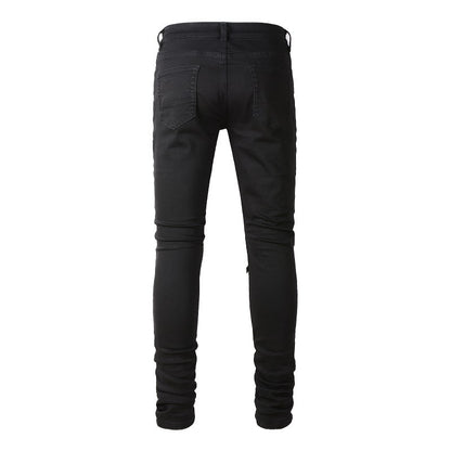 Jean slim noir pour homme avec grandes déchirures au genou et motif patchwork 